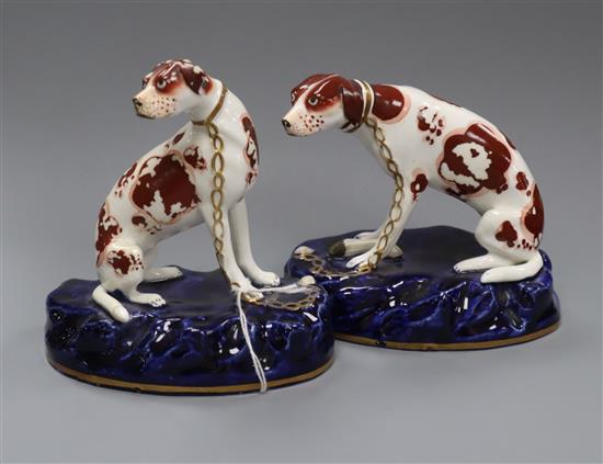 A pair of 19th century English porcelain models of setters tallest 12cm